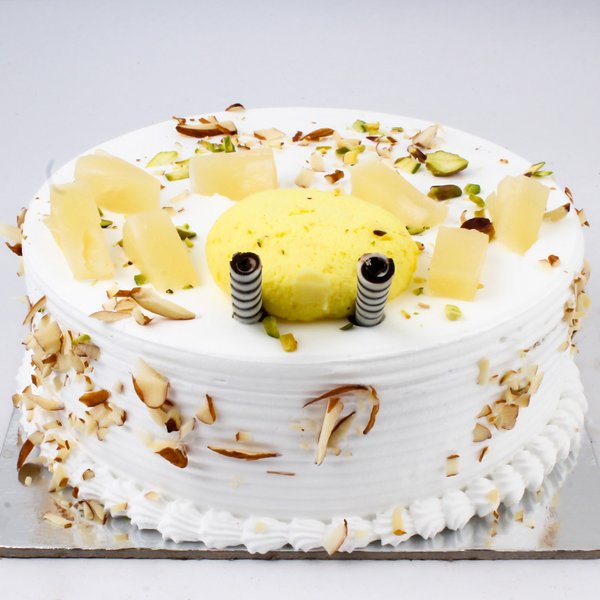cakezone pineapple rasmalai cake halfcute b5378c30 4e53 11ea b29c d7f78a91d86d