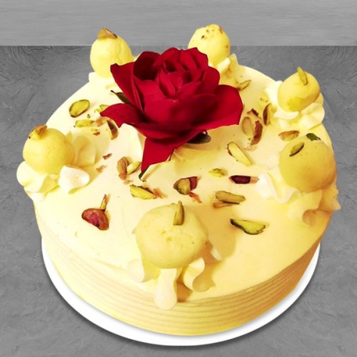 ras malai cake with rose on top 500x500 1