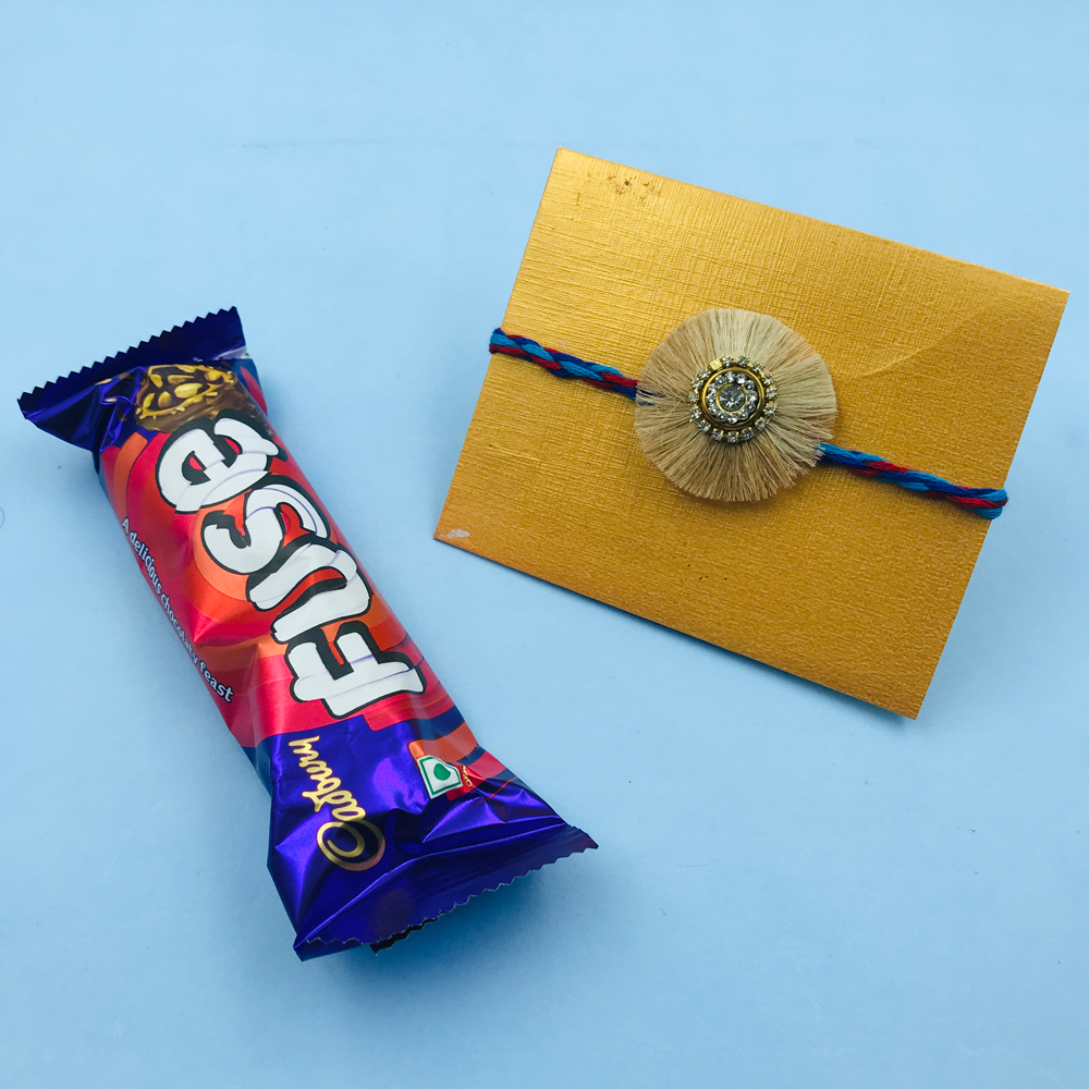 Sacred Rakhi Thread And Chocolate Combo