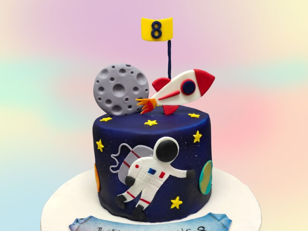 space theme birthday cake e1690630122168
