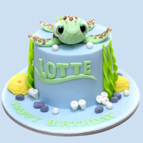 smiling turtle theme cake